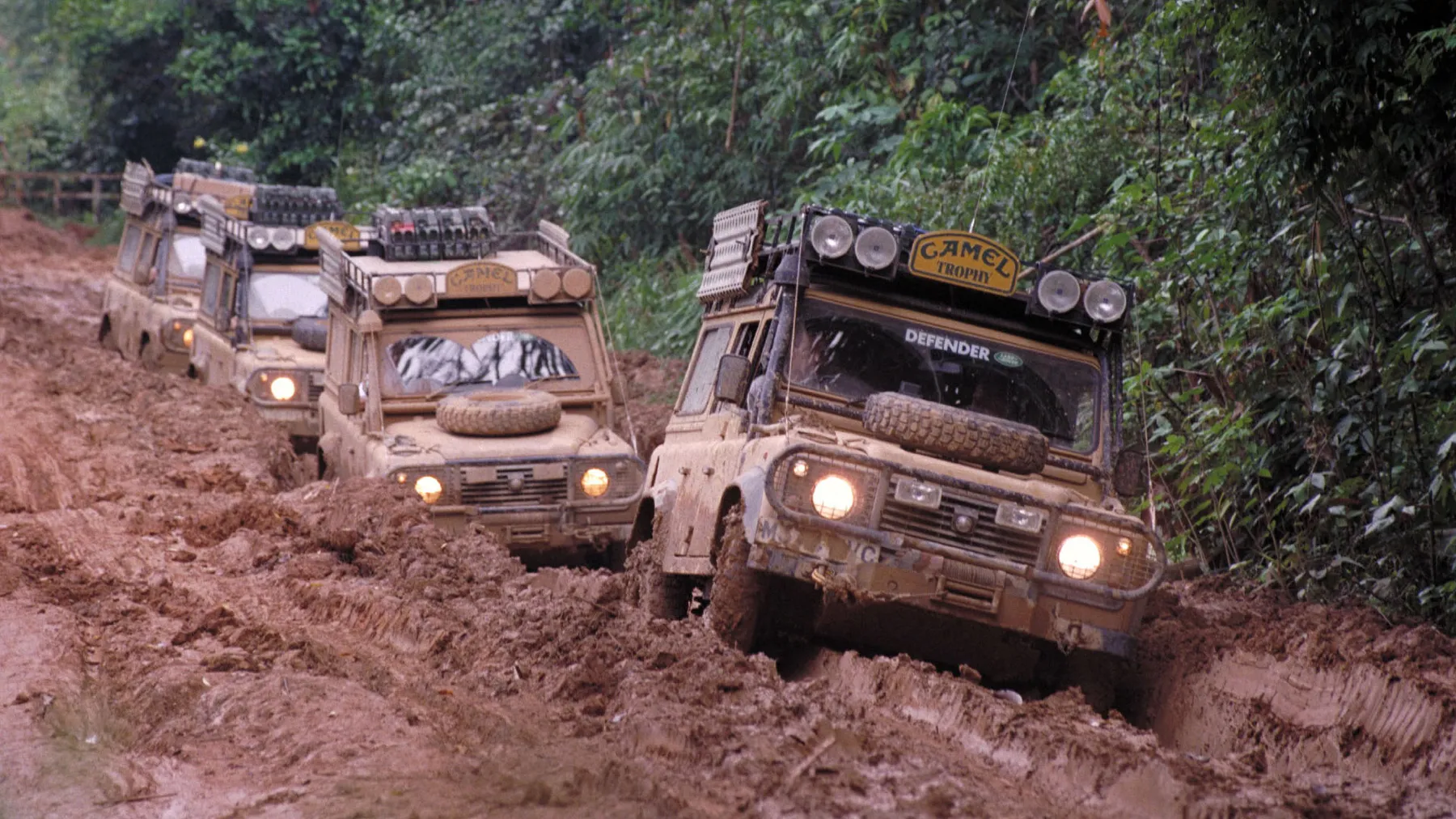 A Camel Trophy team and vehicles